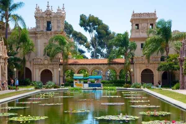 Balboa Park featuring a garden, a pond and heritage architecture